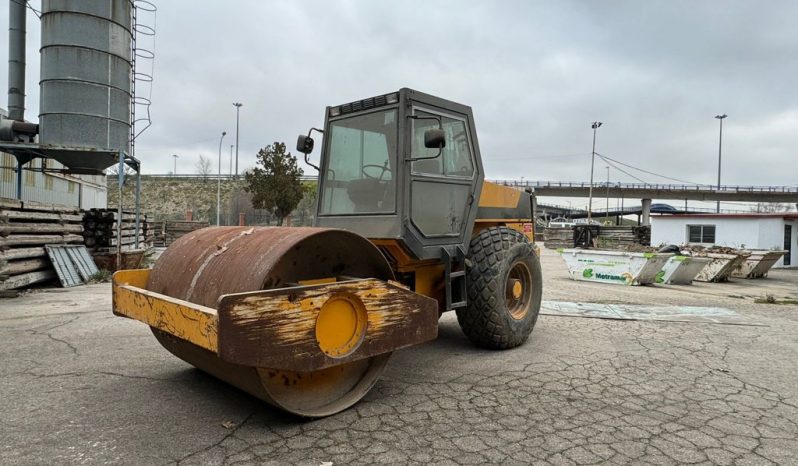 
								MAQUINA APISONADORA KOMATSU JV 110 A completo									